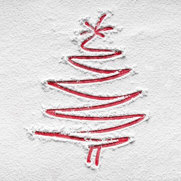 Ein in den Schnee gezeichneter Tannenbaum.